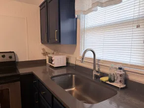Cozy Stay Near DT with Deck and Yard - Image 3