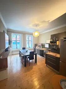 Spacious 3BR Apartment | Family Lounge with TV - Image 2