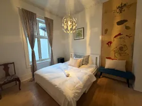 Spacious 3BR Apartment | Family Lounge with TV - Image 5