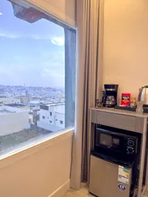 A studio with a beautiful view of the city - Image 3