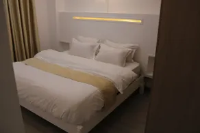 Cozy 2BR w/ Extra Room | Near Malls | 4–6 Guests - Image 4