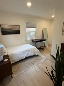 Cozy 2BR Home with Garden Patio - Image 4