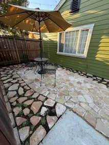 Cozy 2BR Home with Garden Patio - Image 2