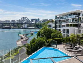 Luxury Riverfront Apt w/ Pool & City Views - Image 5