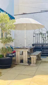 Sunny Patio Retreat Indoor-Outdoor Living Parking - Image 2