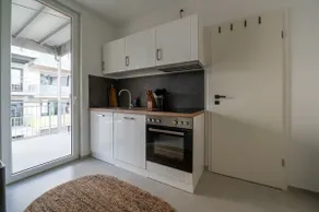 Lightview Apartments Downtown | Parking | Kitchen - Image 5