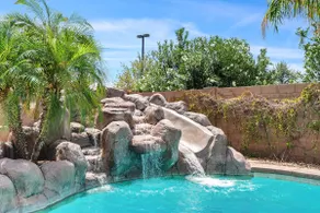 Tiki D's Oasis | Pool with slide • Tiki Bar • Hot tub - Image 2