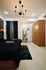 Noir Nook (Couple Friendly 1BHK) - Image 3