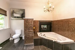 Luxury 4BR Stay with Swim Spa, Golf and Fireplaces - Image 5