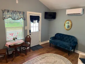 Lady in Blue Cottage - Image 2