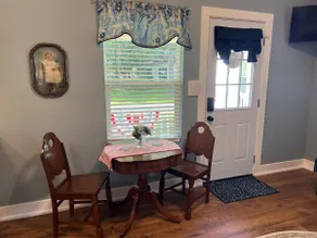Lady in Blue Cottage - Image 3