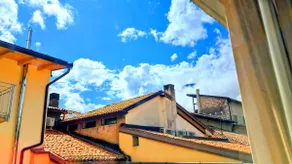 Fashion & Quiet | View of the Mountains and the Rooftops of the City Center - Image 2