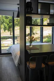 Casa Zero between the forest, river and waterfall. - Image 3
