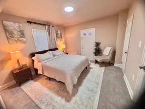 Modern Suite Near DC | Balcony + Workspace - Image 4
