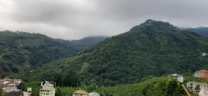 A house with a mountain view, a garden and a children's playroom. - Image 2