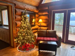 A cozy, romantic lake view log cabin with hot tub & wood burning fireplace. - Image 3