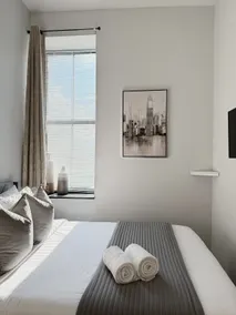 Downtown 2BR • 2 Baths • Walk to PPAC & Dining - Image 3