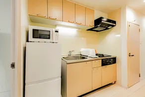 5-minute walk from Fukuoka Tenjin subway station. Renovated apartment. 1 double bed and 1 sofa bed. - Image 4