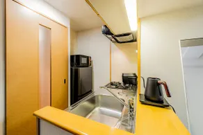 5-minute walk from Fukuoka Tenjin subway station. Renovated apartment. 1 double bed and 1 sofa bed. - Image 2