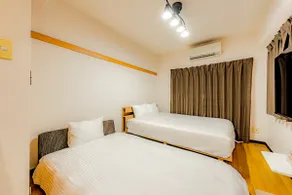 5-minute walk from Fukuoka Tenjin subway station. Renovated apartment. 1 double bed and 1 sofa bed. - Image 5