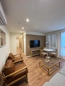 Apartamentos de Angel 1, Suite with bathroom and sofa... - Image 2