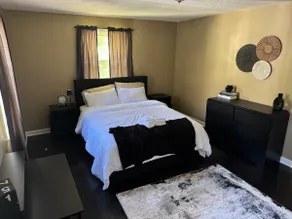 Modern 2BR Home w/ Finished Basement & Sunroom - Image 3