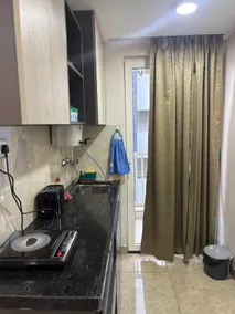 Cozy Room with Balcony Access - Image 3