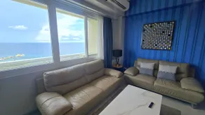 09 Brandnew Lux. 2 BR Condo-plage + 5 piscines - wow vue sur la mer Chambre / salon - Image 5
