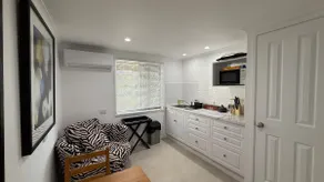 1BR unit w/ lounge & kitchenette, private entry - Image 2