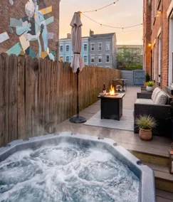 Lux 4BR Retreat w Hot Tub and Patio Near OTR / DT - Image 4