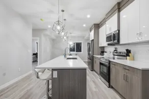 7 Min to Airport | AC | 4BR 3.5BA + Den - Image 3