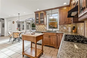 Spacious 4BR Tudor with Patio near Downtown - Image 4