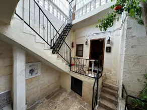 Traditional Courtyard Stone Mansion - Image 4
