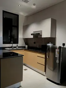 Spacious Modern 1BR in Athaiba | Pool & BBQ Area - Image 5