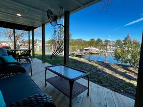 Heron's Nest Back Creek Villa Covered Deck - Image 3