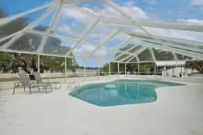 Sunny Lakeside Retreat with Pool and Firepit - Image 3