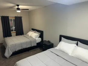 Room 1 - Corner Room with a Downtown View - Image 2