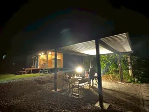 An entire designer trailer house. Pets are allowed. Equipped with a projector and a private barbecue area with a grill. - Image 3