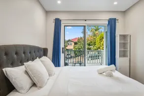Modern Family Oasis Luxe with Balcony AC and Backyard) - Image 5