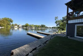 All-Sports Lakefront w/ Private Beach + Tiki Bar - Image 5