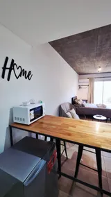 Smart Stay in Pilar: Industrial Style with Garage - Image 4