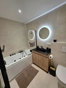 Quiet and cozy apartment – spa bath & garden - Image 4