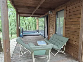 Romantic chalet with private hot tub in the forest - Image 4