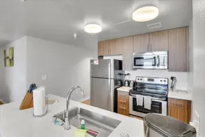 Bright Modern 1BR w/ Kitchen + Workspace - Image 3