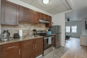 Boho 2BR Retreat w/ Patio • Walkable•Near Stadiums - Image 3