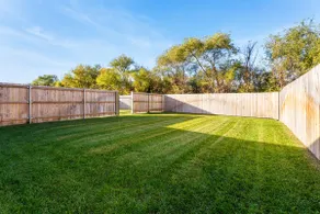fenced backyard w/ w&d + garage | south ict! - Image 4