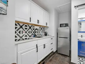 Paradise Coast | Private Patio-Parking | Top Area - Image 3