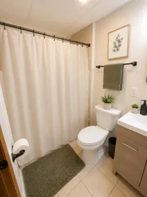 Cozy 1BR End Cottage W/D • Parking •Walk to Train - Image 4