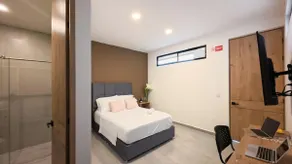 204 -Hotel suite with air conditioning, living room, dining room and kitchen - Image 2