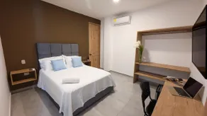 204 -Hotel suite with air conditioning, living room, dining room and kitchen - Image 4